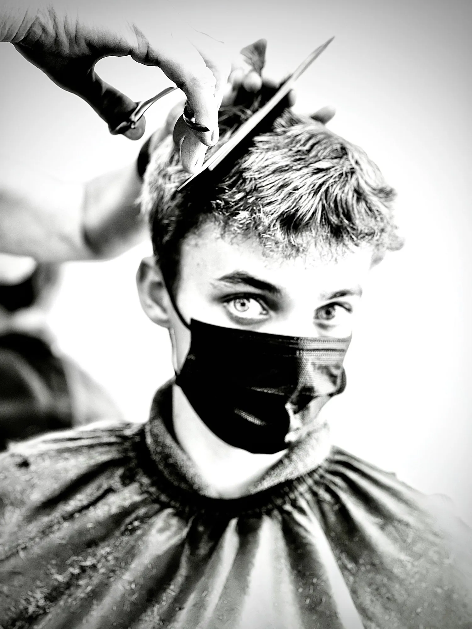 Oliver’s haircut portrait in black and white.