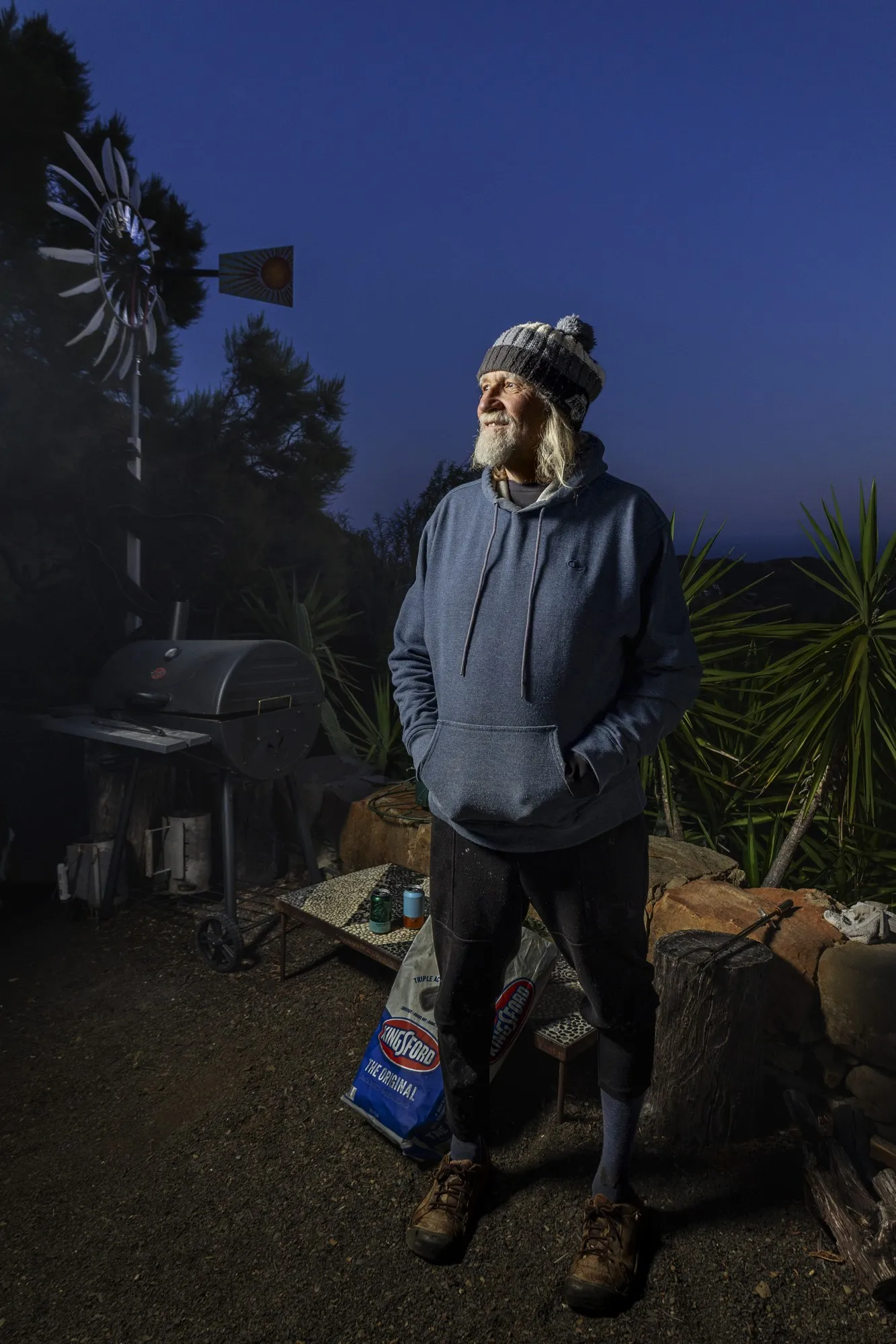 A portrait made outdoors after dark.